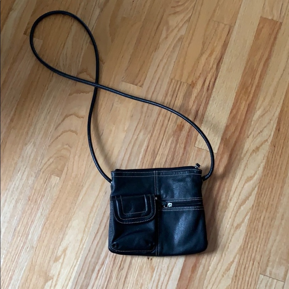 Black leather purse. Rig smell o brand